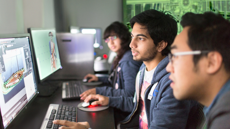 视觉效果的学生在蒙哥马利大厅的计算机实验室合作